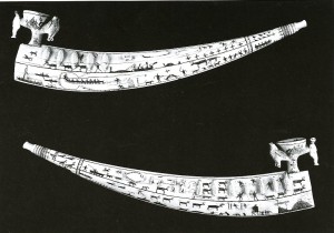 Fig. 3: Two sides of a fancy ivory pipe with both small sculpture and engraving, Seward Penninsula, 1880s. 39.4 cm long. Phoebe Apperson Hearst Museum of Anthropology. From Ray 2003, 21.