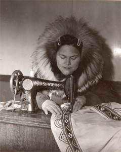 Photograph of Clara Forslund sewing a parka for Gladys Knight Harris, Kotzebue, Alaska, August 8, 1949.  Courtesy Autry National Center of the American West