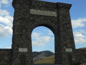 Arch at Yellowstone National Park with the well-known saying. Photo courtesy of Madeline Hirshan